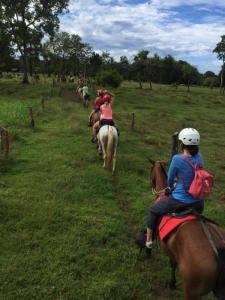 Horseback riding to Hermosa Beach, South Pacific, Costa Rica photo